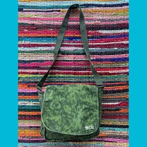 Green floral bag split in amazing Condition does have signs of wear